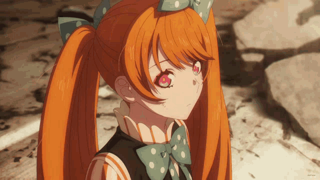 a girl with red hair and a green bow