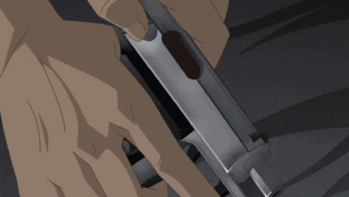 a man in a white shirt is holding a gun in his right hand