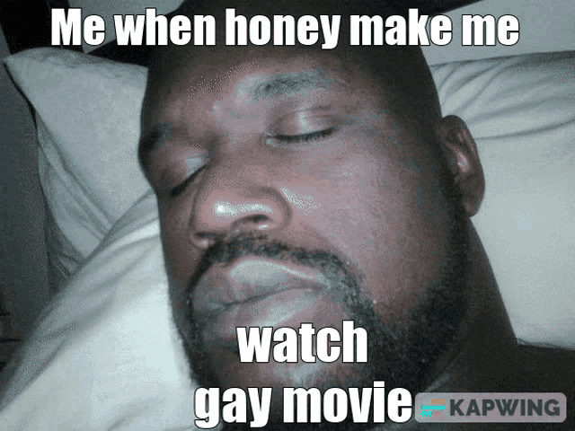 a man with a beard is laying in bed with his eyes closed and a caption that reads me when honey make me watch gay movie