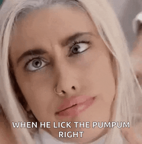 a close up of a woman 's face with the words `` when he lick the pumpum right '' .