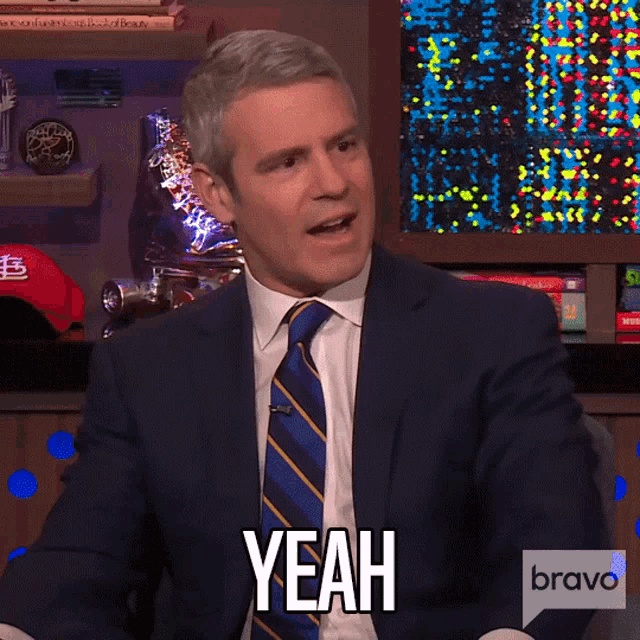 a man in a suit and tie is saying yeah on bravo