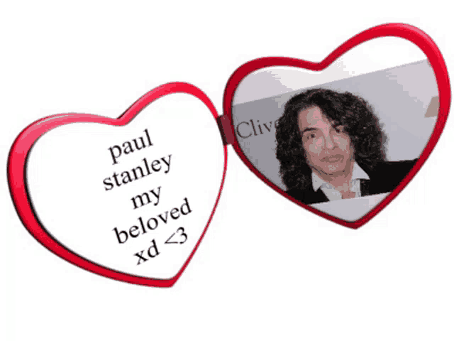 paul stanley my beloved xd < 3 is written on a red heart shaped mirror