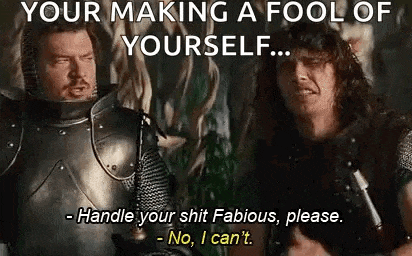 two men in armor are standing next to each other and one of them is making a fool of himself .