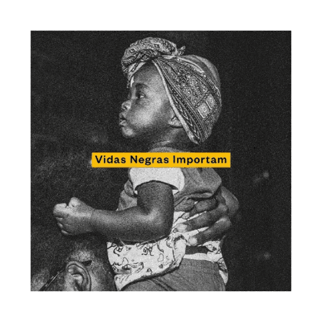 a black and white photo of a person holding a baby with the words vidas negras importam below it .