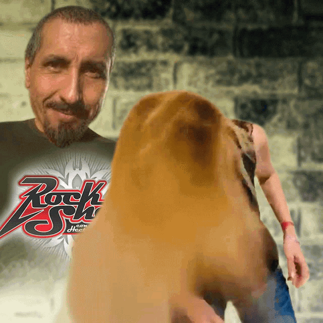 a man with a beard wearing a shirt that says rock star