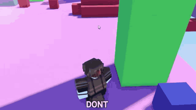 a cartoon character in a video game is standing next to a green block and says do n't .