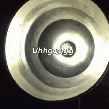 a close up of a metal object with the words uhhgggg written on it