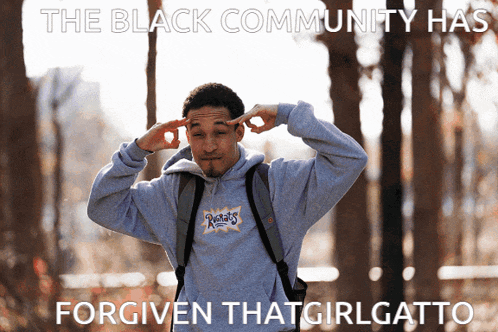 the black community has forgiven that girlgatto written on a poster