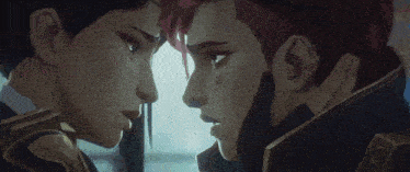a man and a woman are looking at each other and touching each other 's faces .