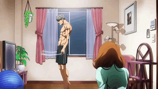 a man is standing in a living room holding a sword while a woman watches