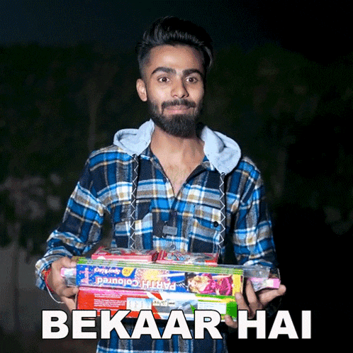 a man in a plaid shirt is holding a stack of fireworks with the caption " bekaar hai "