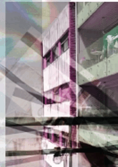 a picture of a building with a purple and green stripe on the side