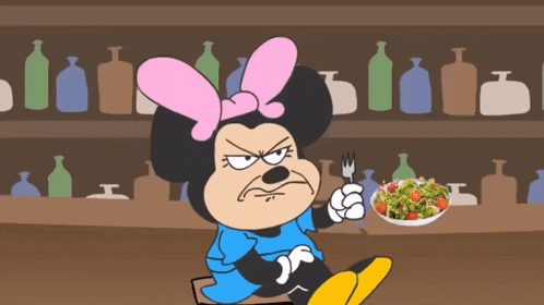 a cartoon of minnie mouse holding a fork and a salad