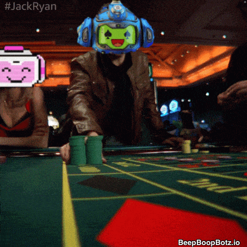 a man wearing a helmet with a face on it playing a game of poker