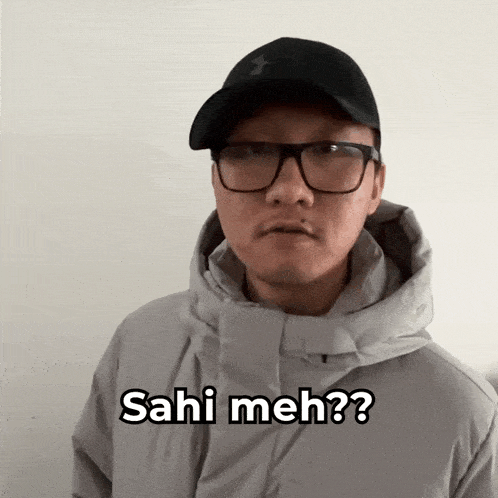 a man wearing glasses and a hat says sahi meh?