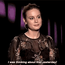 a woman in a floral dress is crying and saying i was thinking about that yesterday