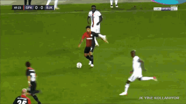 a soccer game between gfk and bjk is going on