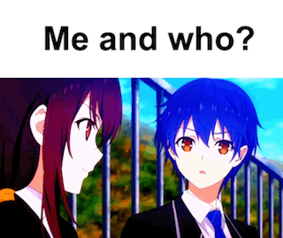 a boy and a girl are standing next to each other .