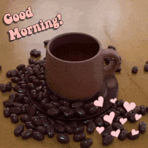 a cup of coffee sits on a saucer surrounded by coffee beans with the words " good morning " above it
