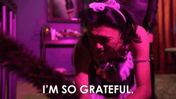 a woman in a maid costume is kneeling down and saying `` i 'm so grateful . ''