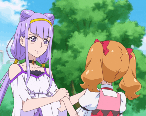 a girl with purple hair is holding the hand of another girl with orange hair