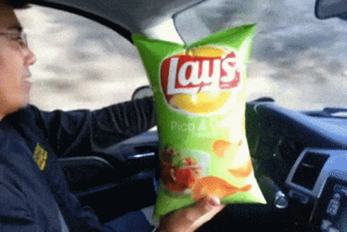 Lays Chips Potato Chips GIF - Lays Chips Potato Chips Driving GIFs