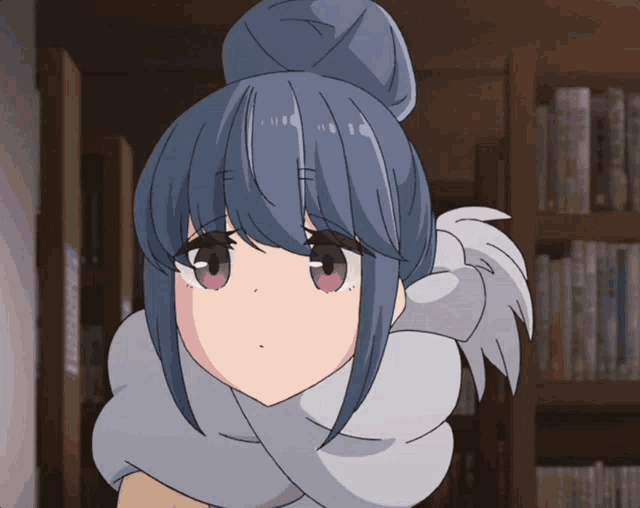 a girl with blue hair and purple eyes is standing in front of a bookshelf