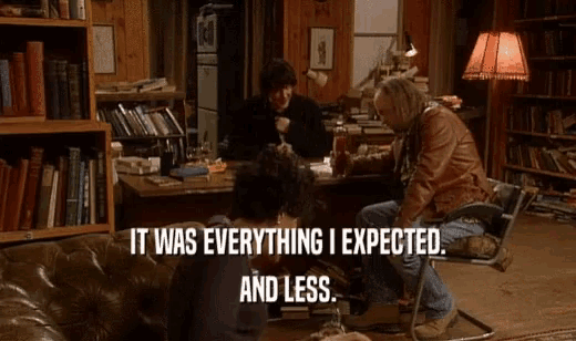a group of people sitting around a table with the words " it was everything i expected and less " above them