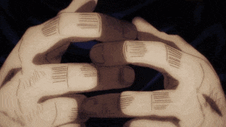 a close up of a person 's hands with tattoos on them
