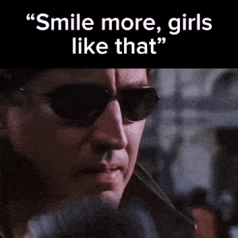 a man wearing sunglasses is talking about smiling more .