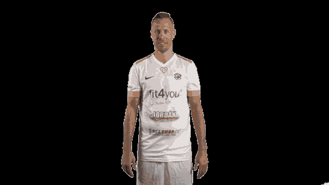 a man wearing a white shirt that says fit4you on the front