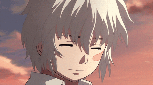 a close up of a person with white hair