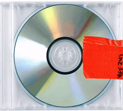 a cd in a clear case with a red sticker on it that says yeezus