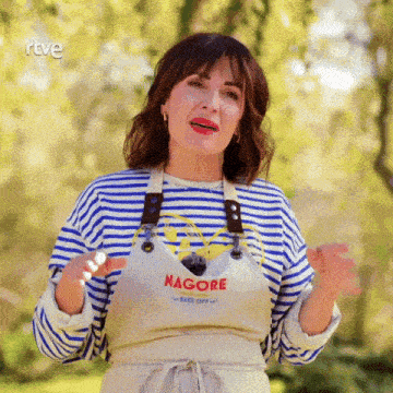 a woman wearing a striped shirt and an apron with the word nagore on it