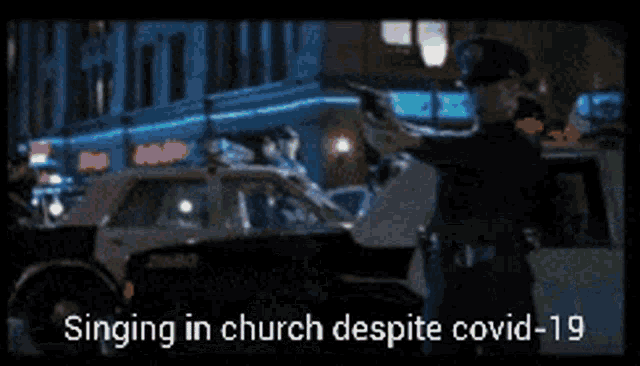 a video of a man singing in a church despite covid-19