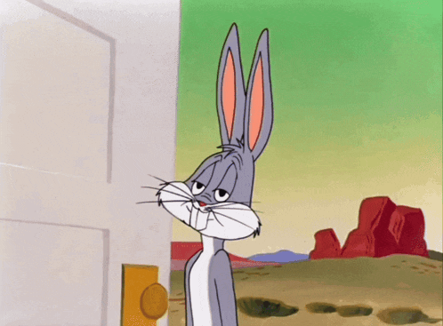bugs bunny is standing in front of a door looking sad