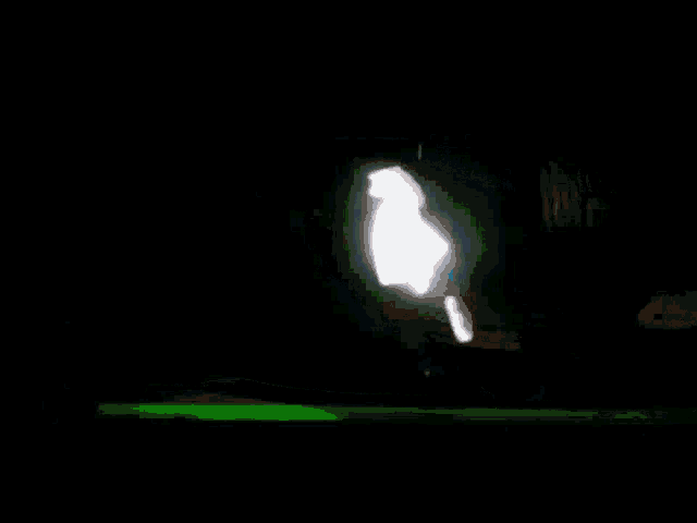 a ghostly figure is appearing on a television screen