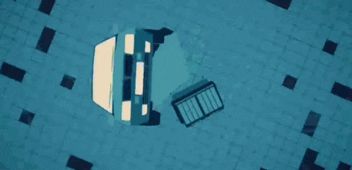 an aerial view of a person swimming in a pool .