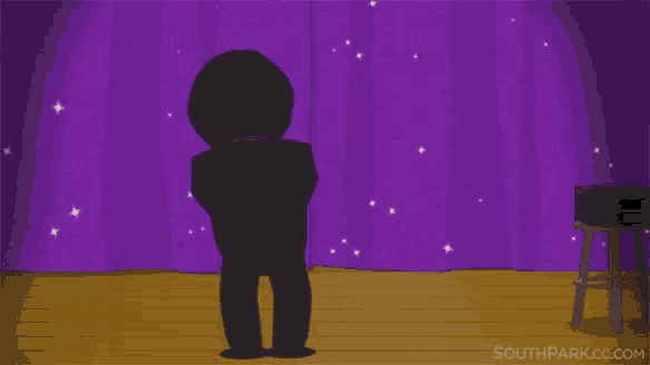 a cartoon character from south park is standing on a stage without a shirt on .