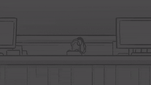 a cartoon character with red eyes is peeking out from behind a desk .
