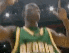 a man wearing a green and yellow jersey with the word storm on it