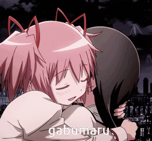 a picture of a girl hugging another girl with the word gabumaru on it
