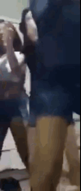 a blurry picture of a man and woman dancing