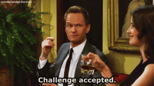 a man in a suit and tie is sitting next to a woman holding a glass of whiskey and saying challenge accepted .