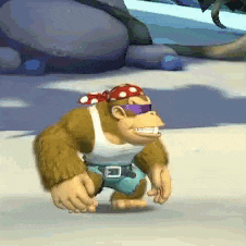 a cartoon gorilla wearing sunglasses and a bandana is walking on the beach .
