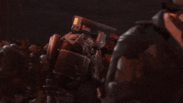 a robot with the word enemy on the back