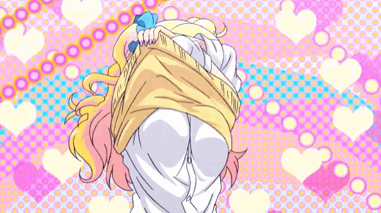 a girl with blonde hair and a red bow on her tie
