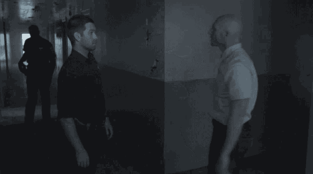 a blurry image of a person walking in a dark room .