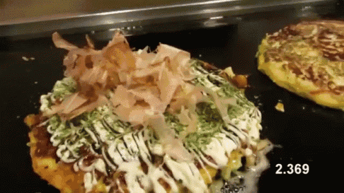 a close up of a food item with the number 2 369 on the bottom right