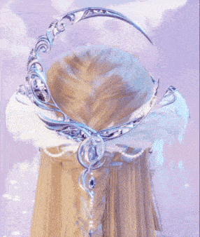 a close up of a person 's hair with a crescent moon shaped headpiece